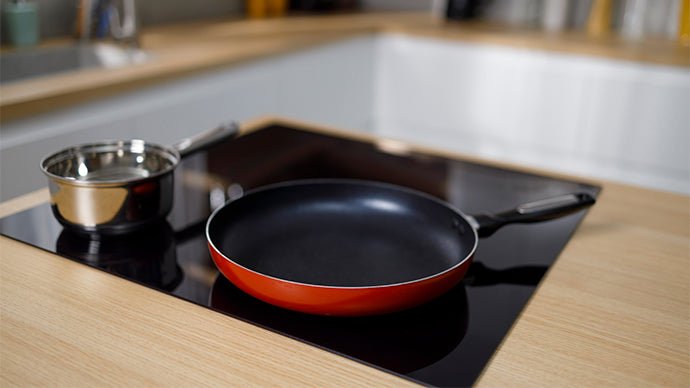 How do induction hobs compare to gas and electric cooking hobs?